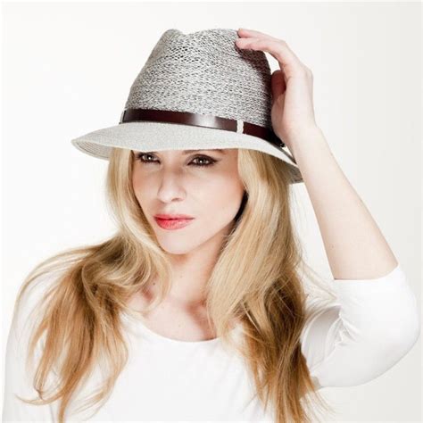 Rock a wutcu hat with a bow for a boho-chic look